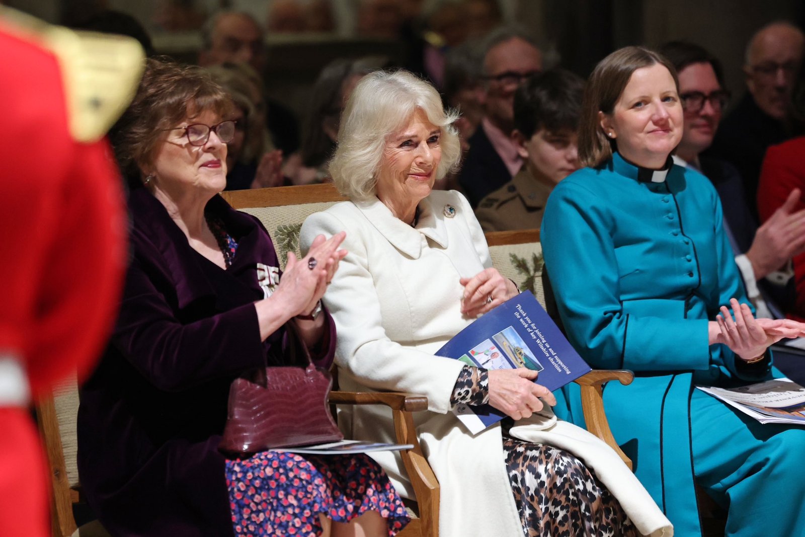 Camilla wearing Queen Mary’s Diamond and Emerald Celtic Knot Brooch