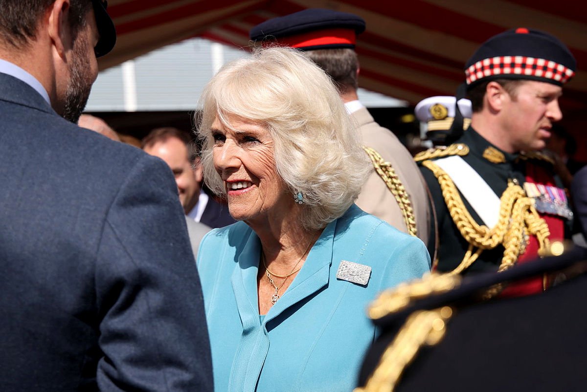 Camilla wearing the art deco brooch in France. (Defence Imagery)