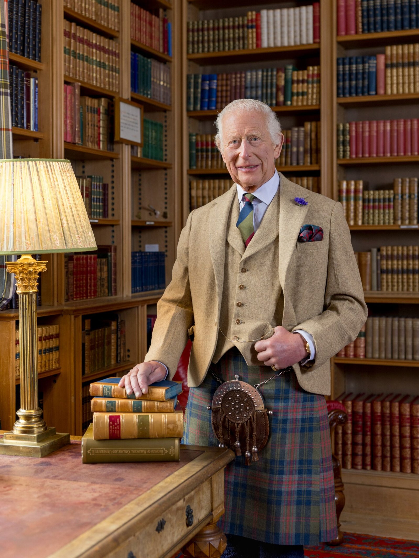 King Charles pictured in the library of Balmoral. (Buckingham Palace)