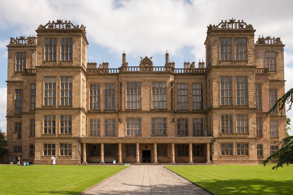 A photo of Hardwick Hall, with its symmetrical front wing, and ES emblems 