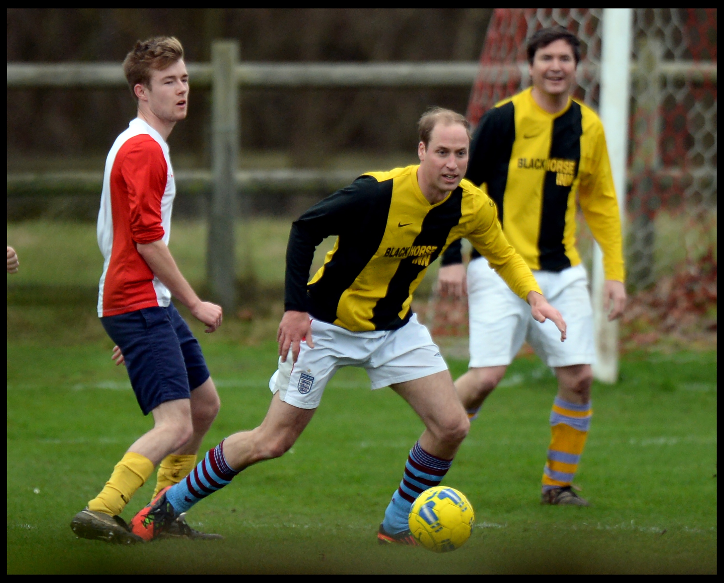 William & Harry compete in traditional Christmas Eve football match