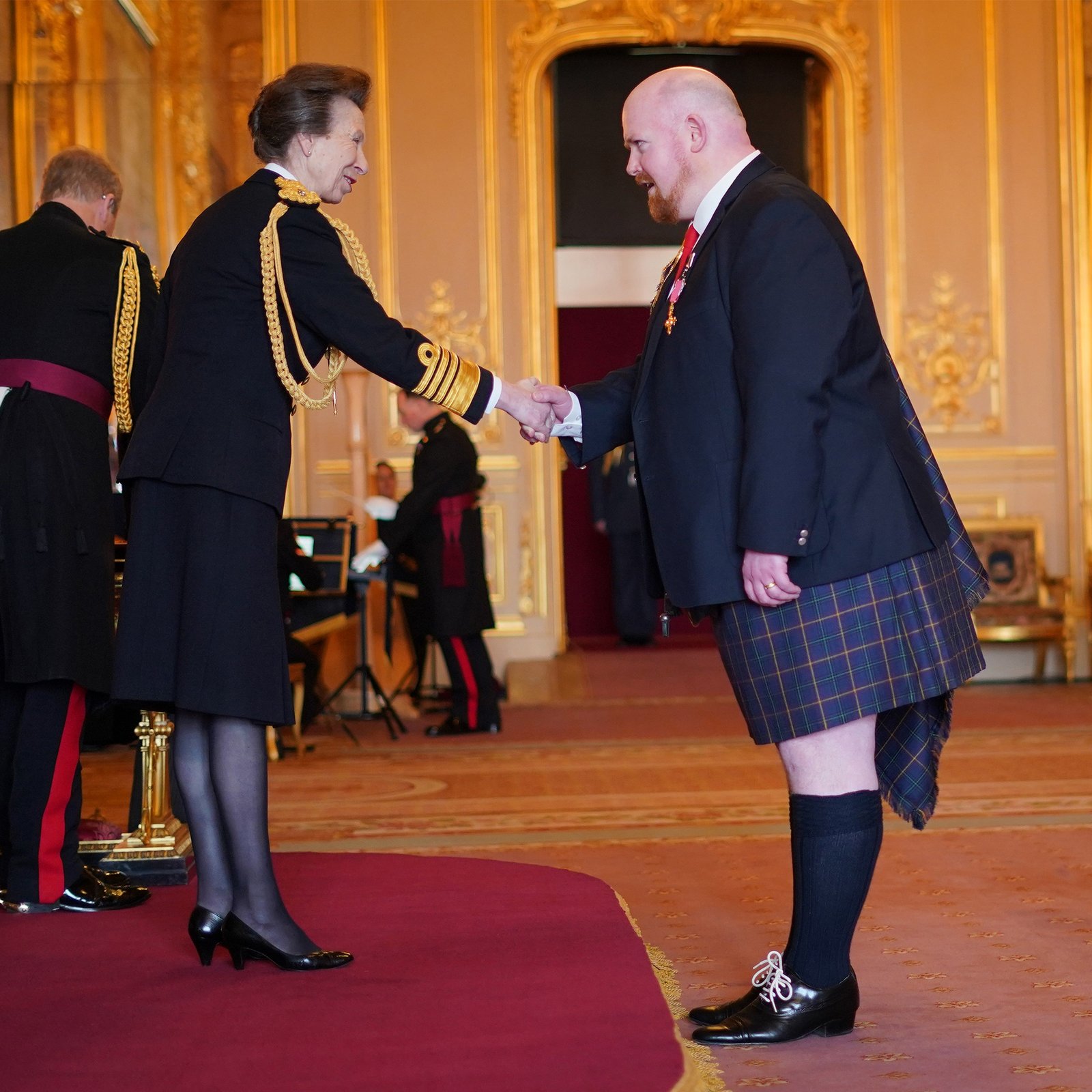 Princess Anne conducting an investiture. (Royal Family)