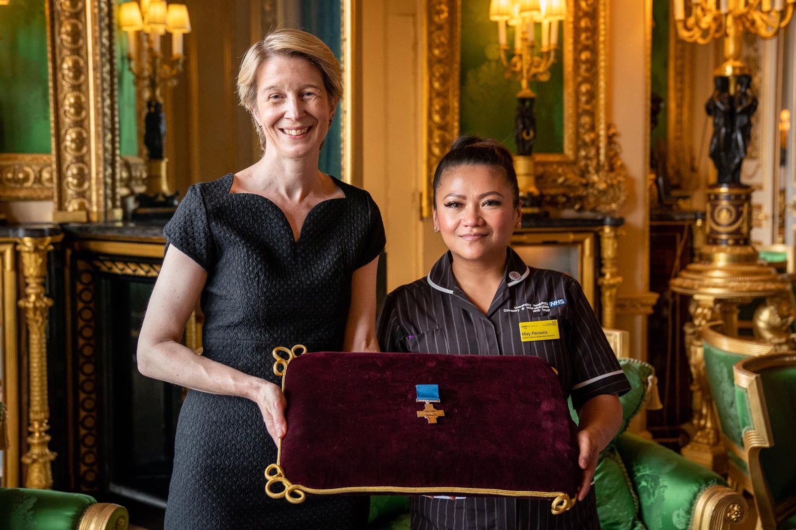 NHS officials receiving the George Cross. (Royal Family)