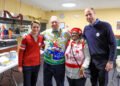Like father, like son: Prince George and William make Christmas lunch at homeless charity