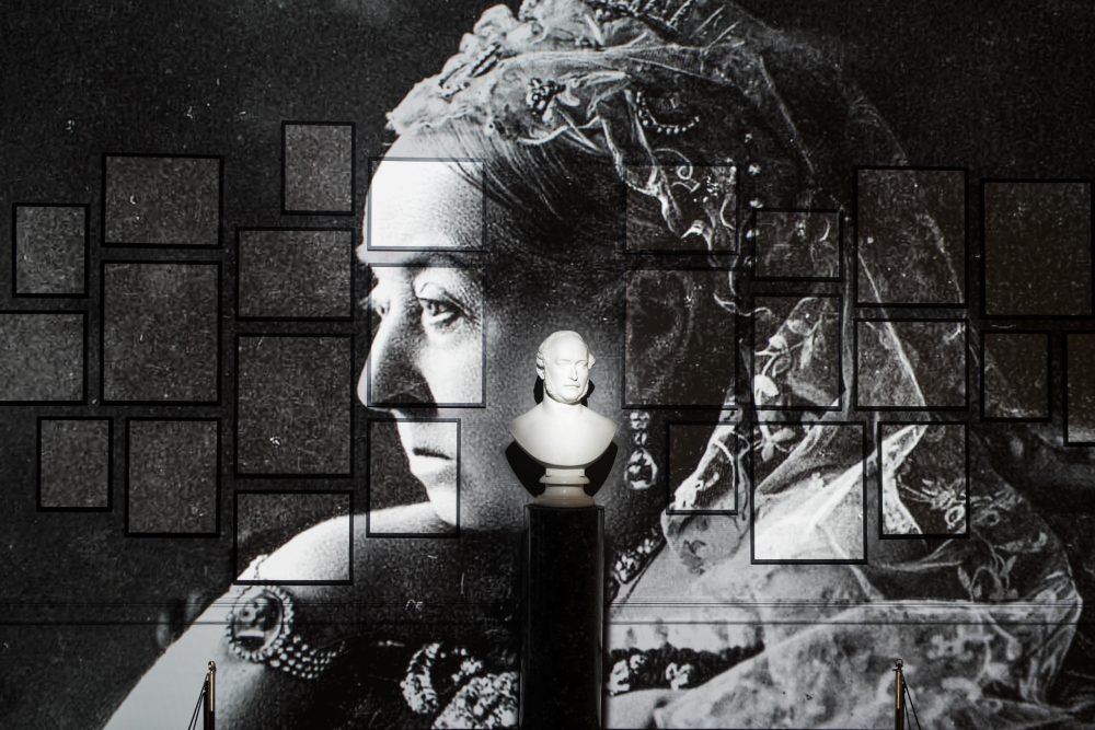 Image of the mourning room in 'Victoria Revealed', featuring a bust of Albert and related digital projection. (HRP)