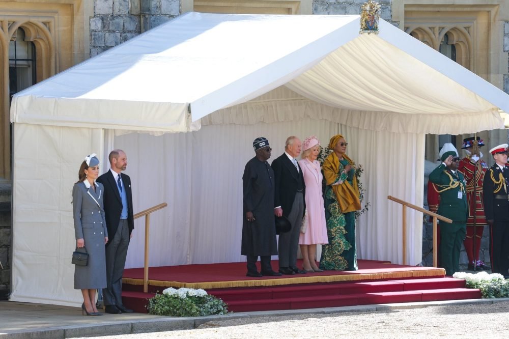 (Left to right) The Princess of Wales, the Prince of Wales, President of Nigeria Bola Ahmed Tinubu, King Charles III, Queen Camilla and First Lady Oluremi Tinubu inspect a Guard of Honour during the ceremonial welcome at Windsor Castle, Berkshire, on day one during the President and First Lady¥s state visit to the UK. Picture date: Wednesday March 18, 2026.