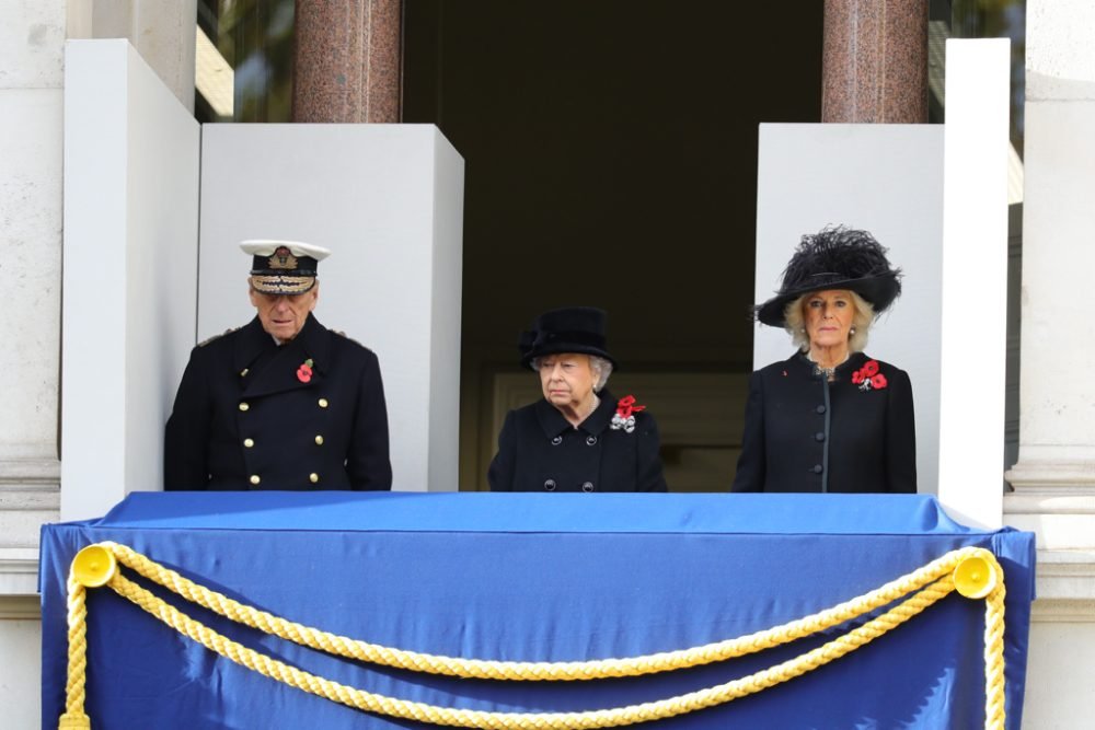 The queen stood with prince philip and camilla, duchess of cornwall for the service; prince charles laid her wreath at the cenotaph mod)