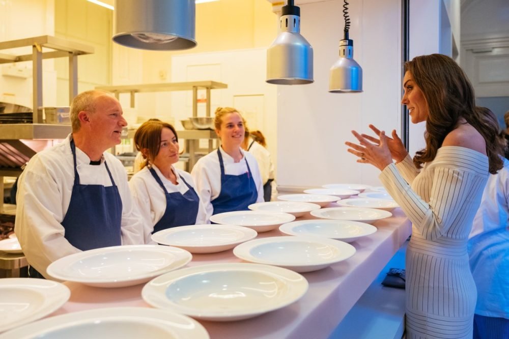 kate chats to Action on Addiction clients Jay Otty and Melanie Bennett, who were working in the kitchen for the dinner (kensington palace)