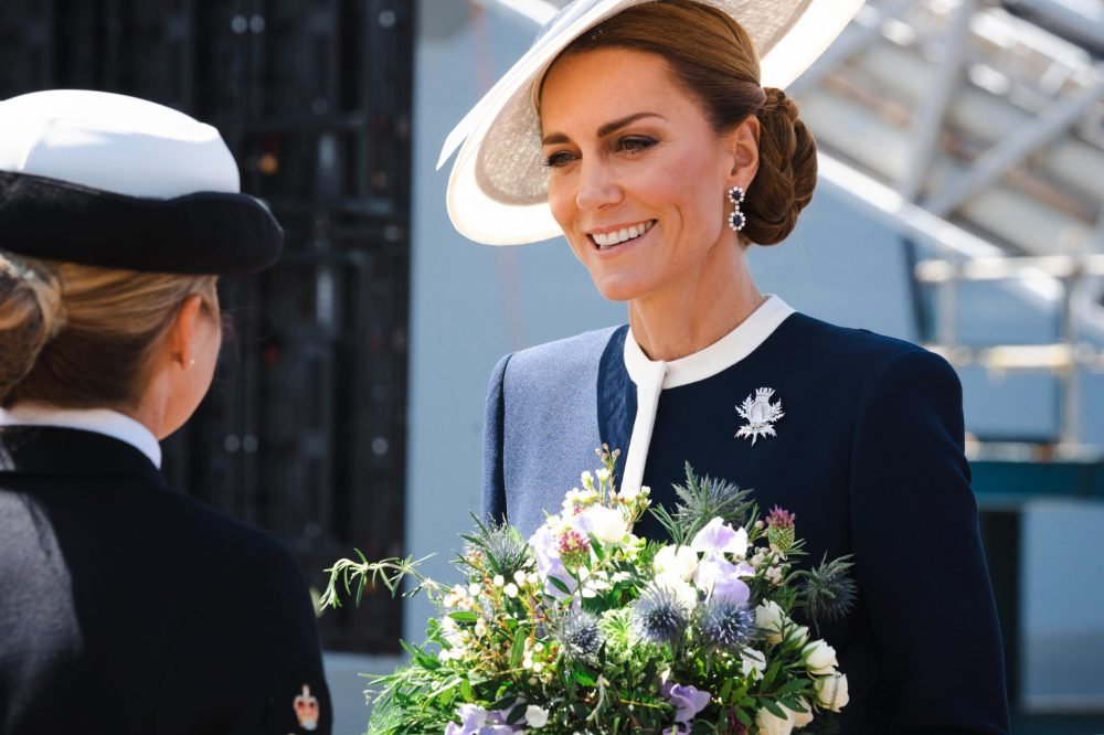 Pictured: Her Royal Highness The Princess of Wales holding a bouquet from children at the Naming Ceremony.

Her Royal Highness The Princess of Wales, Sponsor of HMS Glasgow, today gave her blessing to the Royal Navy’s newest warship.

Smashing a bottle of whisky against the hull for good luck, Her Royal Highness formally named HMS Glasgow, the first of eight Type 26 frigates at the leading edge of naval warfare.

To cheers from hundreds of friends, family, workers, VIP guests and the 45-strong ship’s company at BAE Systems shipbuilding facility in Scotstoun, The Duchess of Rothesay, as she is known in Scotland, declared the time-honoured words: “I name this ship Glasgow. May God bless her and all who serve in her.”