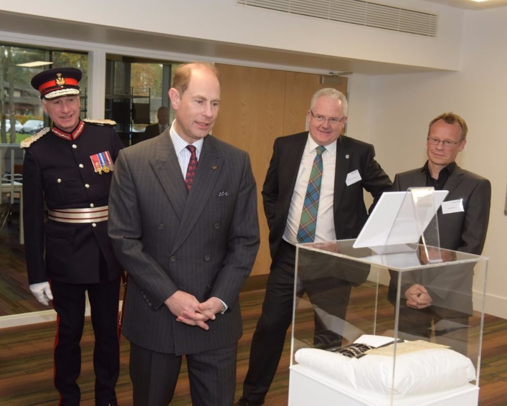 DOhrQNQXUAI3mXD prince edward views the university's anniversary book '50 years in 50 objects' (Tony Gorzkowski)