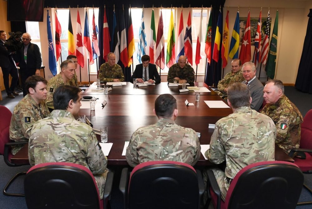 the prince of wales is briefed on the rapid response unit's work (clarence house)