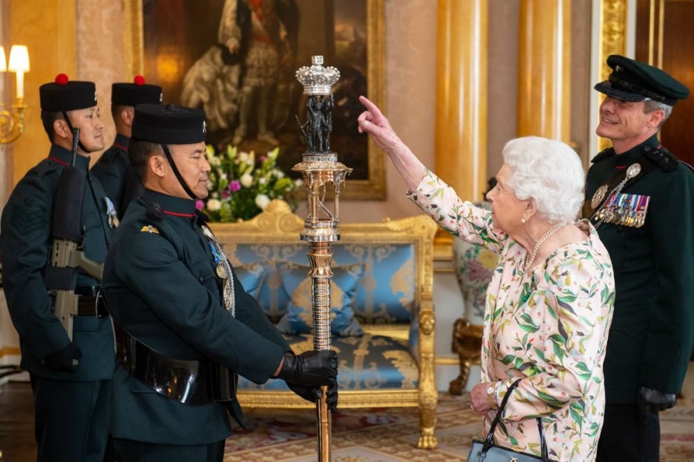 the queen examines the staff, which is presented to the monarch (royal family)