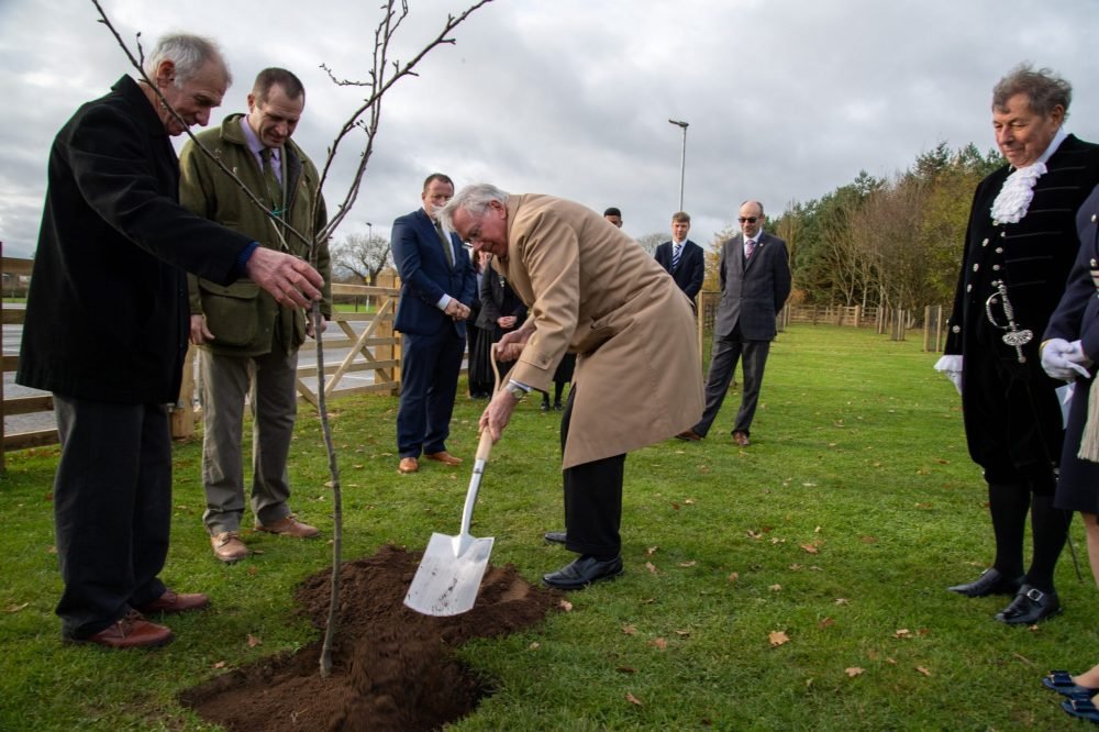 The Duke of Gloucester planted a tree in the orchard to commemorate the life of Prince Philip. (Royal Family/Twitter).