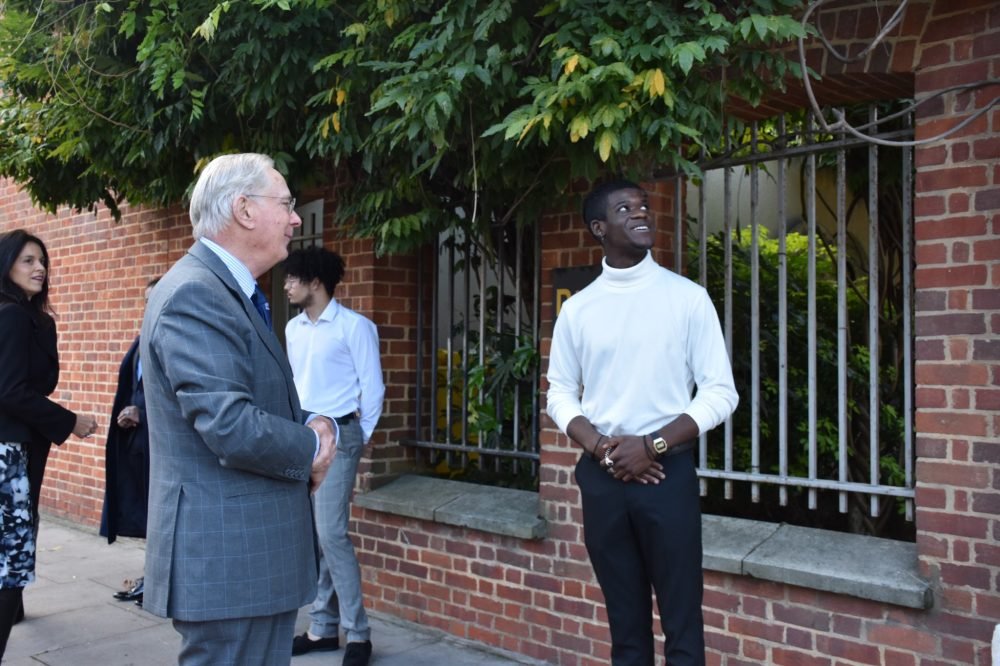 The Duke of Gloucester taking to those involved in the programme. (@TheRoyalFamily)