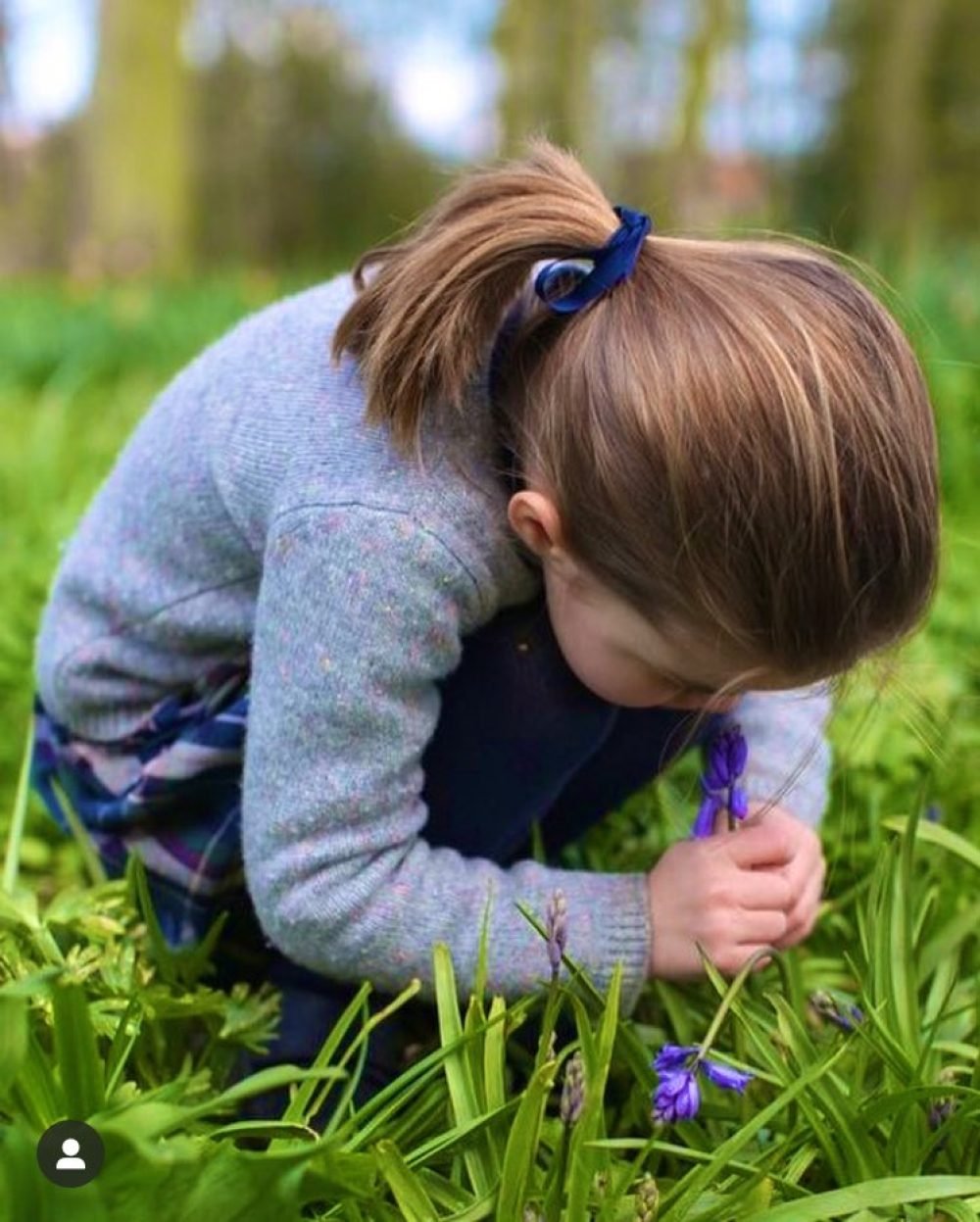 A new photo of Princess Charlotte, smelling a blue bell (Kensington Palace)