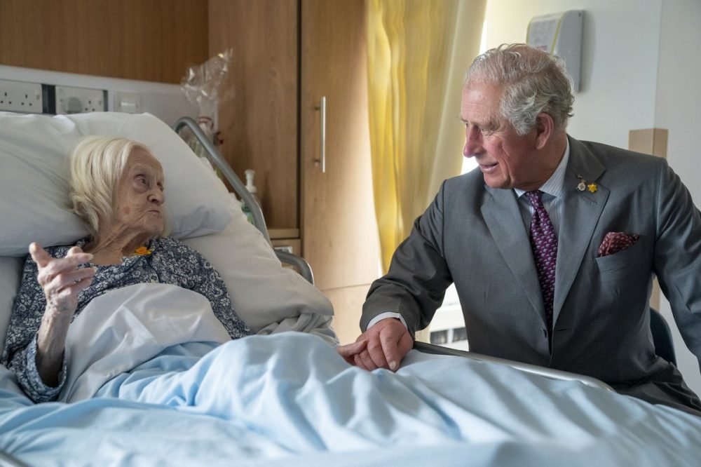 The Prince of Wales took the time to sit with 97 year old Maureen and hold her hand at the Marie Curie Cardiff Hospice (Marie Curie)