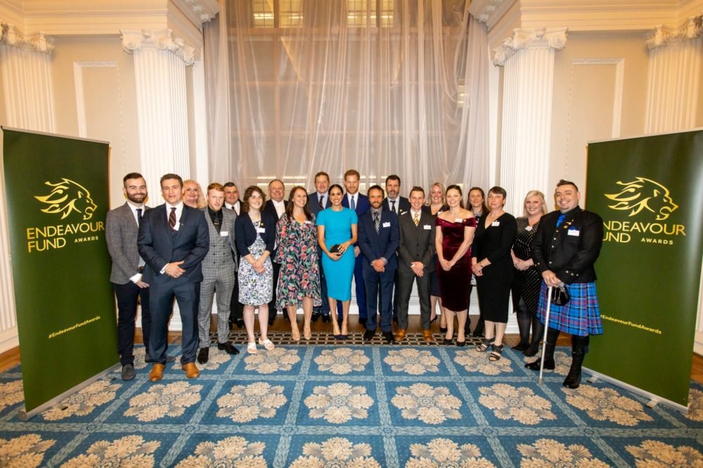 ESXu9-0WoAEzc2Q The Duke and Duchess of Sussex pose for a photo with nominees at the Endeavour Fund awards (Endeavour Fund)