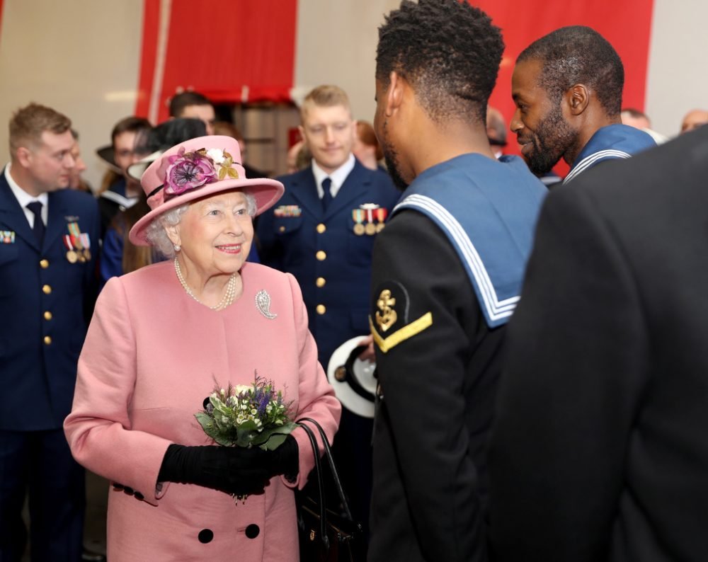 The queen speaks to members of hms oceans crew as it is decommissioned mod)