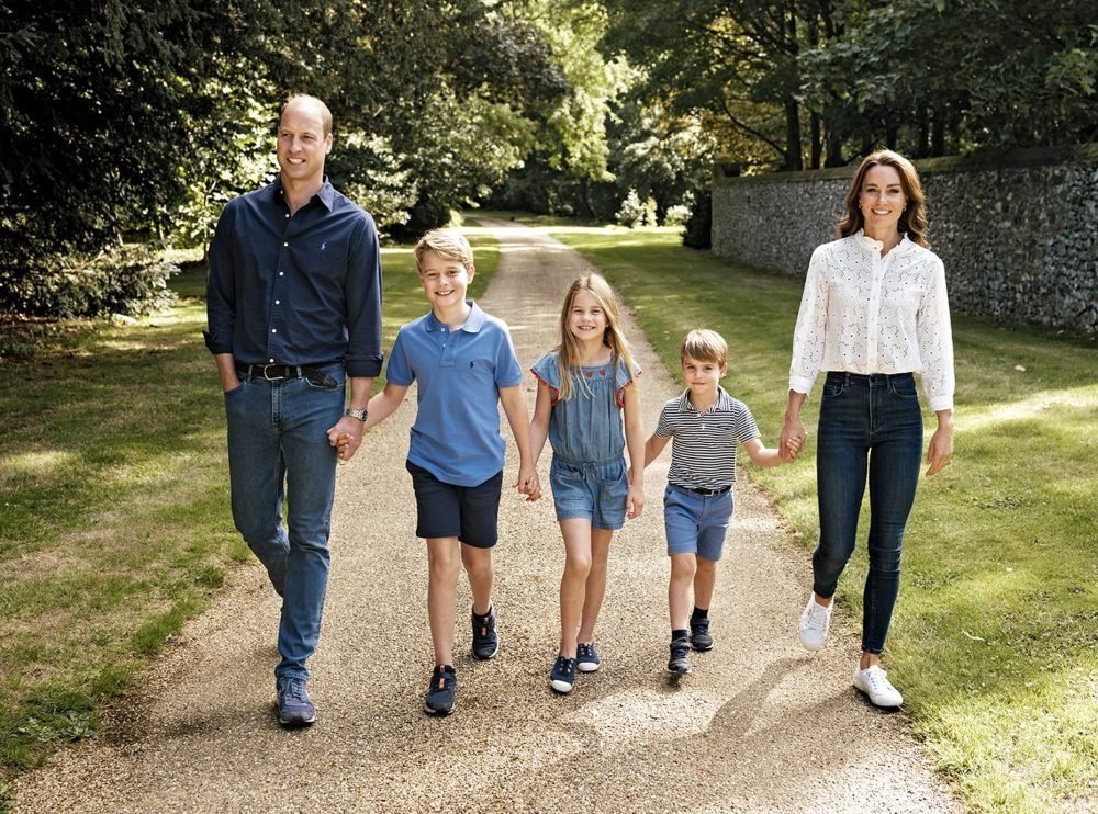 The Prince and Princess of Wales walk hand in hand with their children, Prince George, Princess Charlotte and Prince Louis (Kensington Palace)