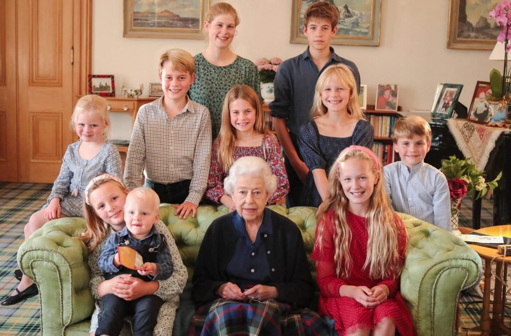 The late Queen with some of her grandchildren and great-grandchildren. (Kensington Palace).