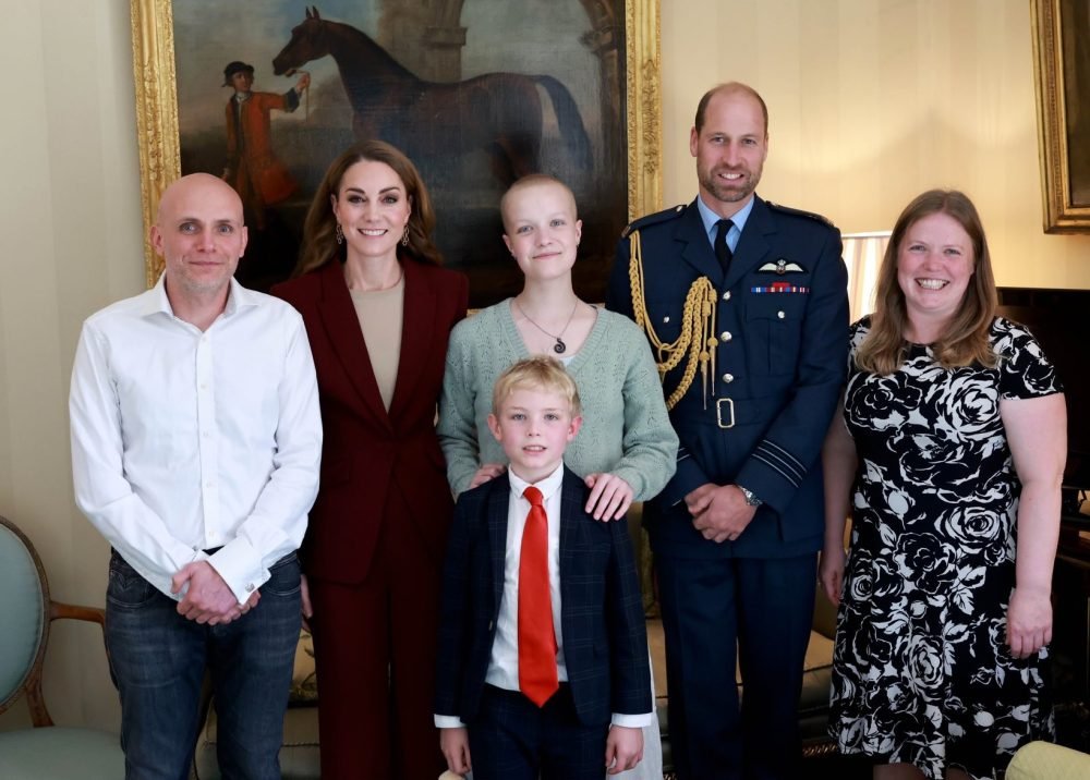 Liz with her family, alongside The Prince and Princess. (Kensington Royal).