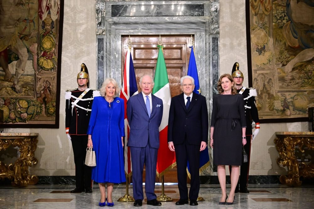 The King and Queen and The President and his daughter standing together. (Royal Family)