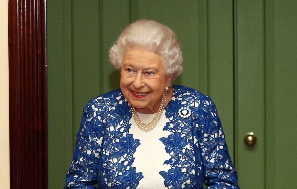 The Queen wearing Victoria's sapphire brooch - a wedding gift from Prince Albert. Picture by  i-Images / Pool