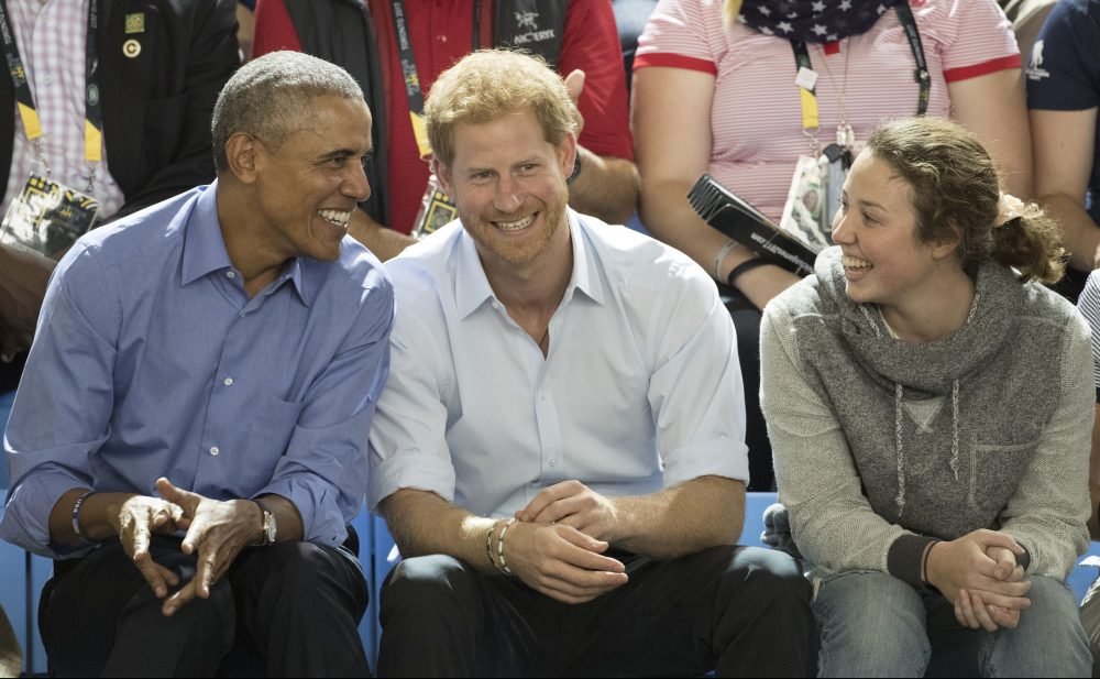 Prince Harry and former US President Barack Obama watch the wheelchair basketball at the Invictus Games in Toronto, Canada.  Picture by Stephen Lock / i-Images