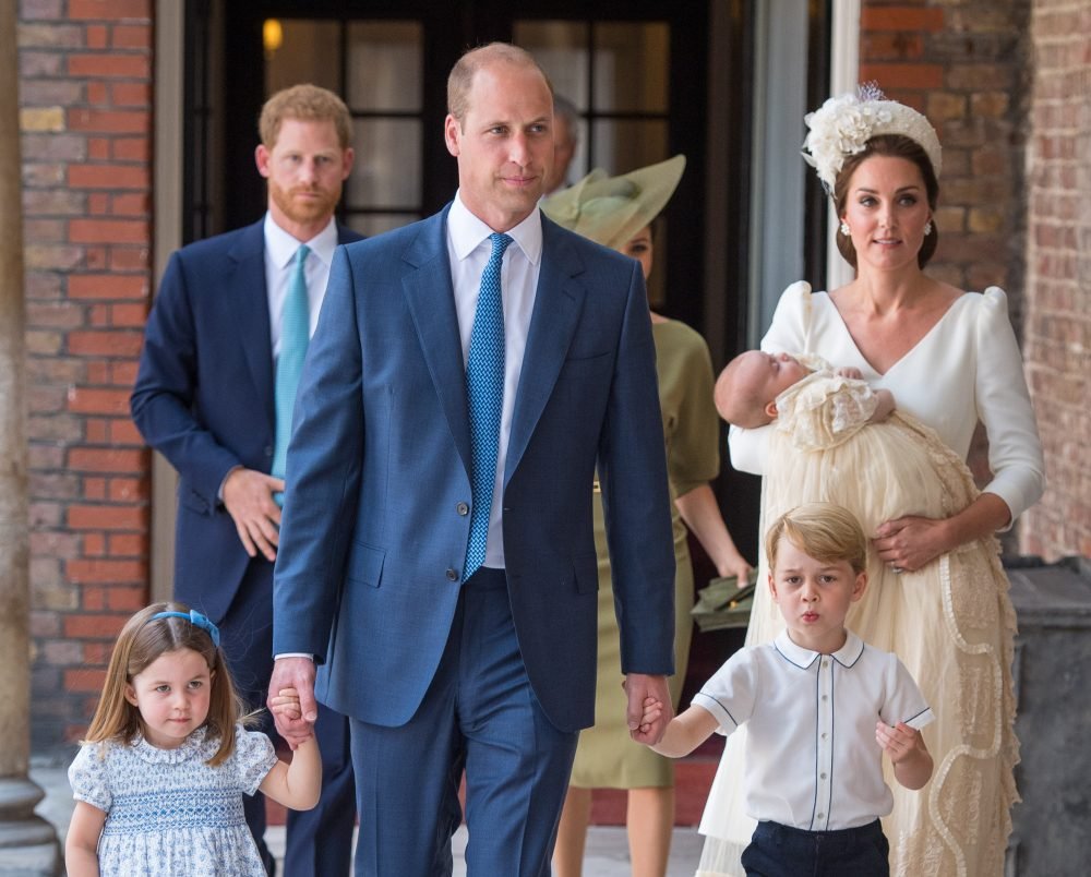 Image licensed to i-Images Picture Agency. 09/07/2018. London, United Kingdom. Princess Charlotte and Prince George hold the hands of their father, the  Duke of Cambridge, as they arrive at the Chapel Royal, St James's Palace, London for the christening of their brother, Prince Louis, who is being carried by their mother, the Duchess of Cambridge.  Picture by  i-Images / Pool