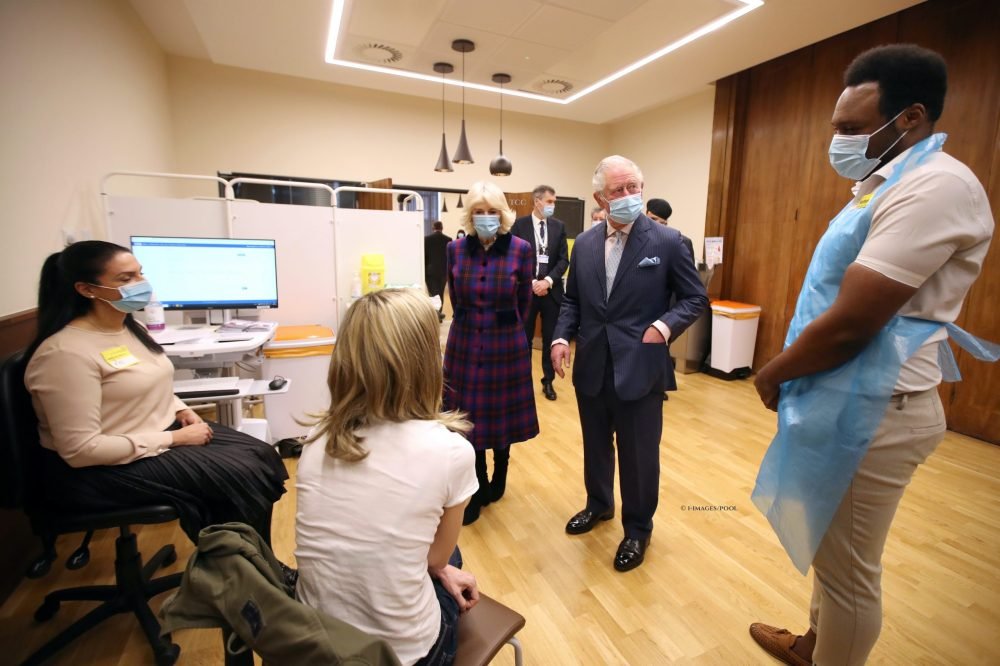 Prince Charles and Camilla, The Duchess of Cornwall, during a visit to  the Queen Elizabeth Hospital in Birmingham, where they thanked individuals for taking part in clinical trials and administering COVID-19 vaccinations.