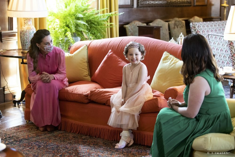 The Duchess of Cambridge meets Mila Sneddon, aged five, at the Palace of Holyroodhouse in Edinburgh. Mila features in an image from the Hold Still photography project which showed her kissing her father Scott through a window whilst she was shielding during her chemotherapy treatment.