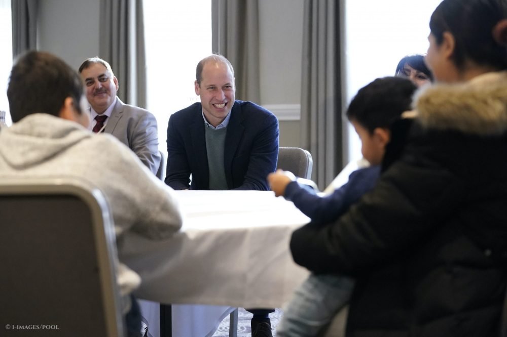 Prince William, The Duke of Cambridge, talks with refugees evacuated from Afghanistan, who are being accommodated at a hotel in Leeds, to see how they are settling in