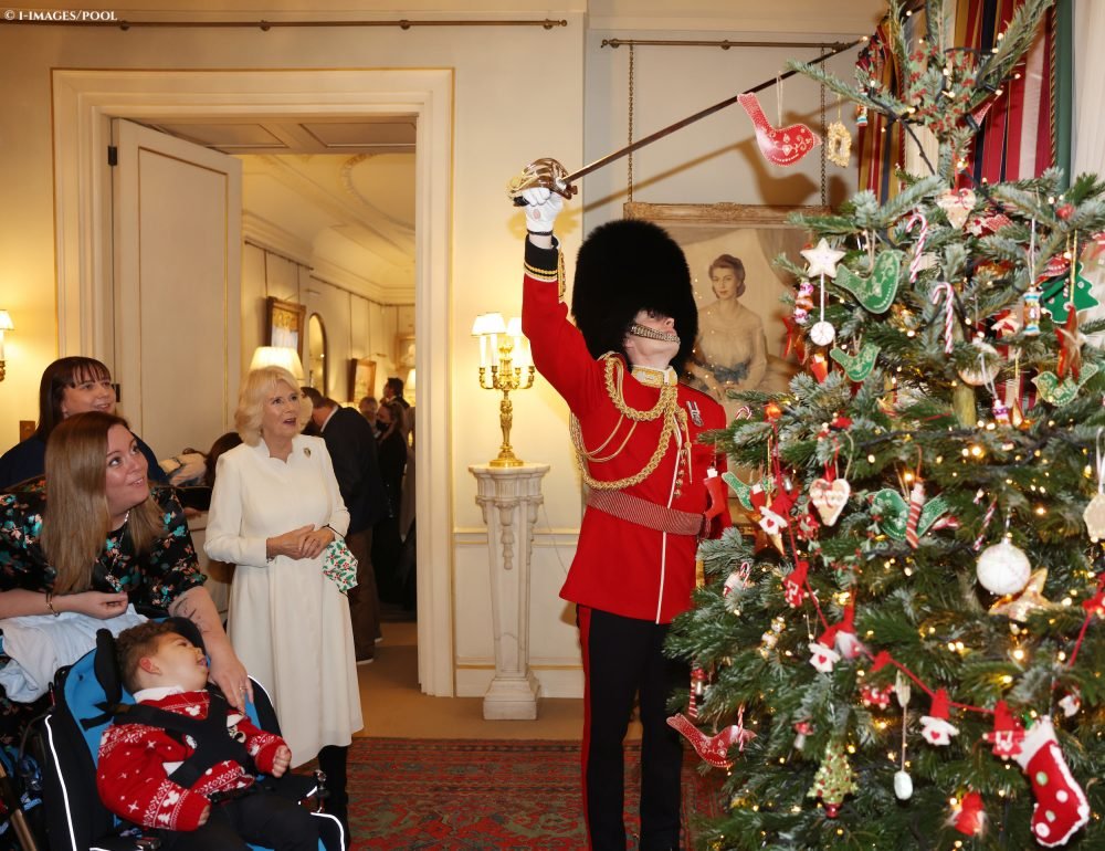 Camilla, The Duchess of Cornwall, with children supported by various hospices were invited to decorate the Christmas tree at Clarence House