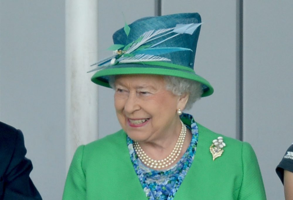 Image ©Licensed to i-Images Picture Agency. 24/07/2014. Glasgow, United Kingdom. HM The Queen and The Duke of Edinburgh watch England playing hockey against Wales at the National Hockey Centre, Glasgow, Scotland . Picture by Andrew Parsons / i-Images