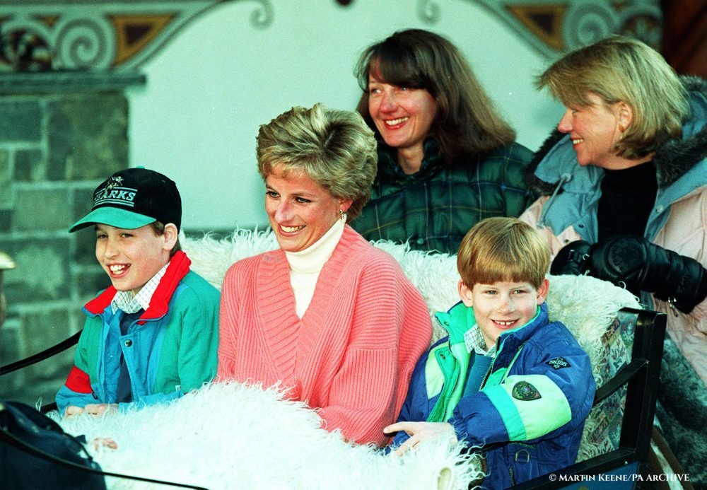 The Princess of Wales and her two sons, William and Harry, ride in a horse-drawn sleigh as they leave their hotel in Lech, Austria in 1994.
