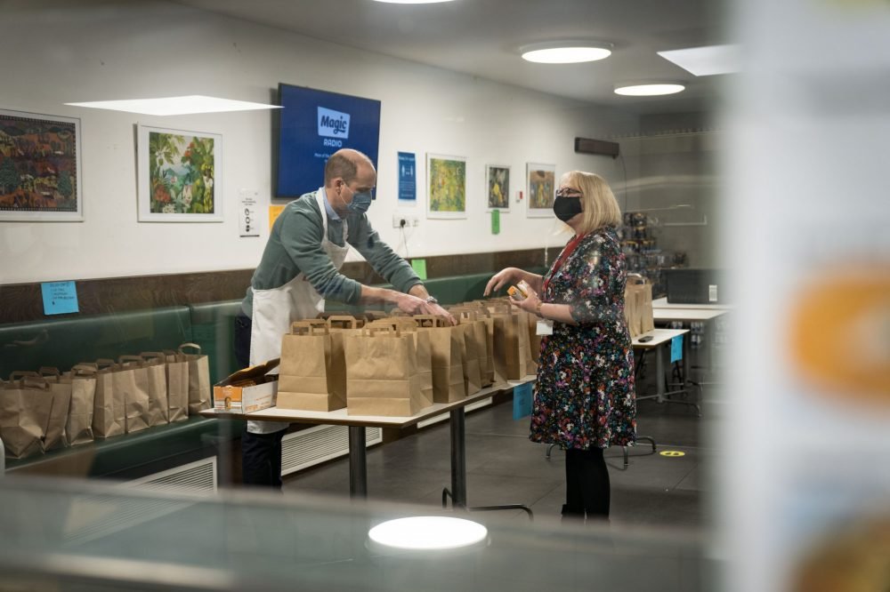 Prince William visited The Passage on three separate occasions to help pack food parcels. (IMAGE: The Passage)