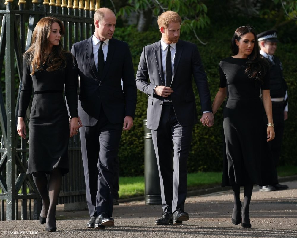 The Prince and Princess of Wales and The Duke and Duchess of Sussex view the tributes left after the death of Queen Elizabeth II, at Windsor Castle