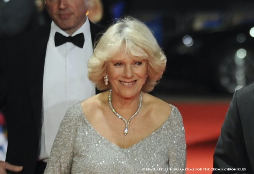 dreamstimemaximum_22767424 The Duchess of Cornwall wears her serpent necklace to the Hugo Royal premiere in 2011