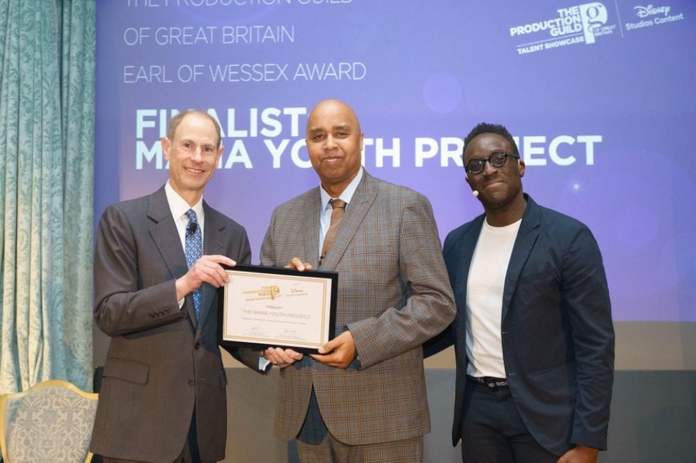 HRH presenting a certificate to one of the finalists, The MAMA Youth Project. (PGGB)