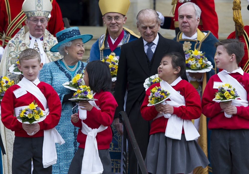 The Queen hands out Maundy Money to those who have supported their church or community. The 2015 service was at Windsor today. I-images